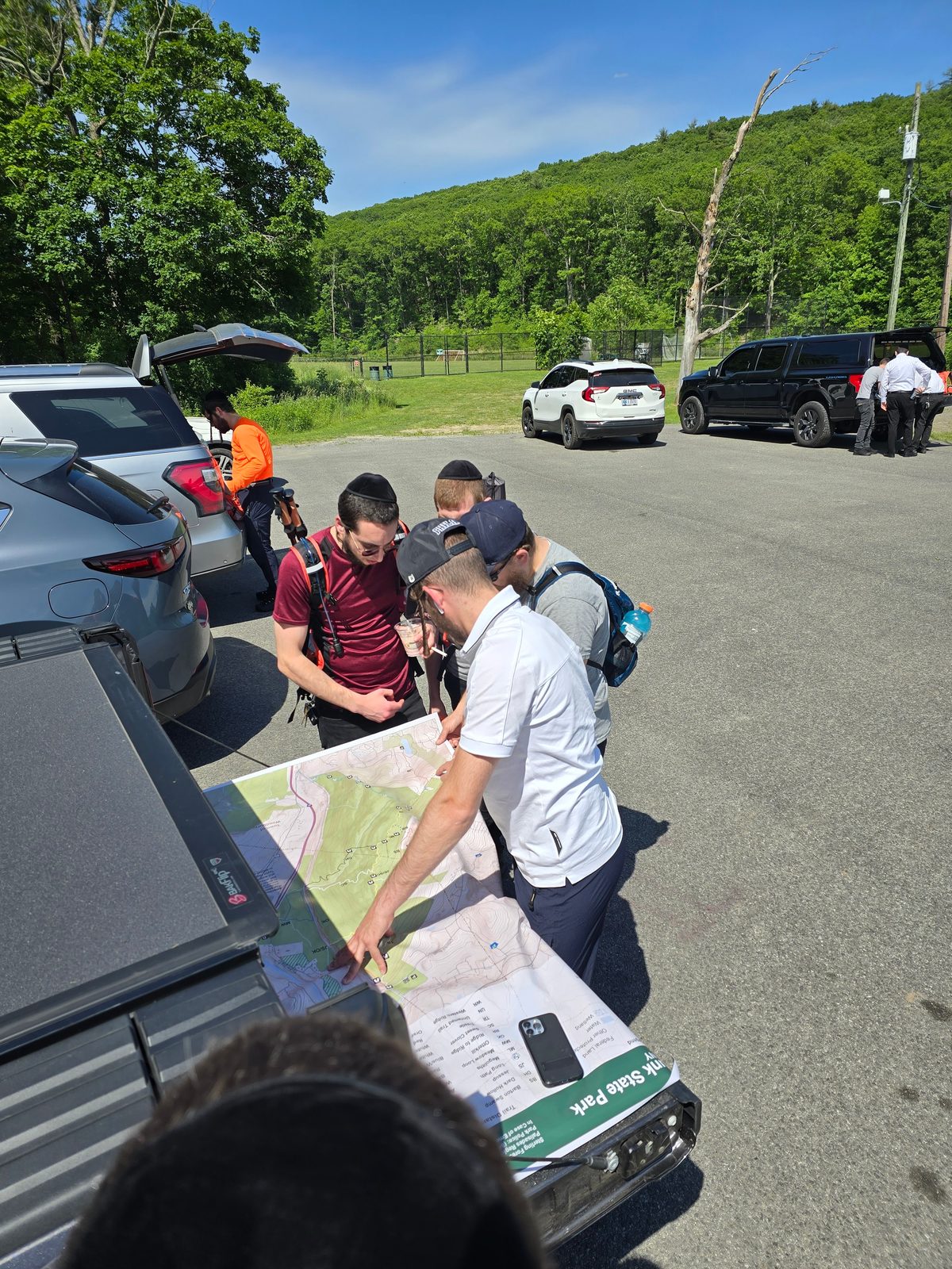 SAR team reviewing trail map
